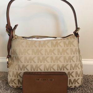 NWOT Michael Kors purse and matching small wallet.